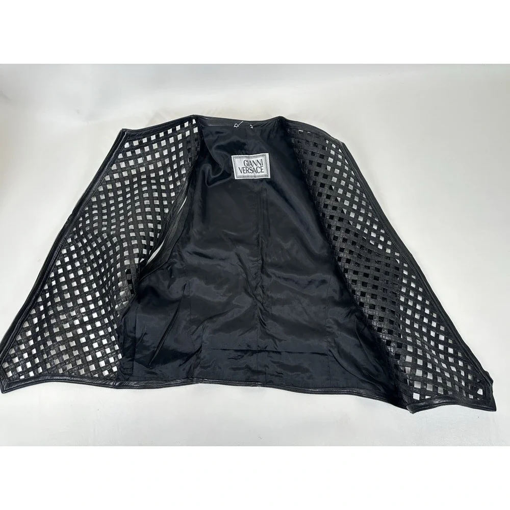 GIANNI VERSACE black leather vest w/ an open lattice feature in front 46